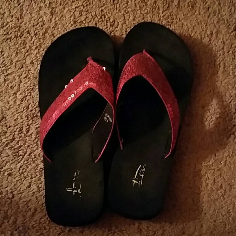 Women's size 8 blue fin flip flops